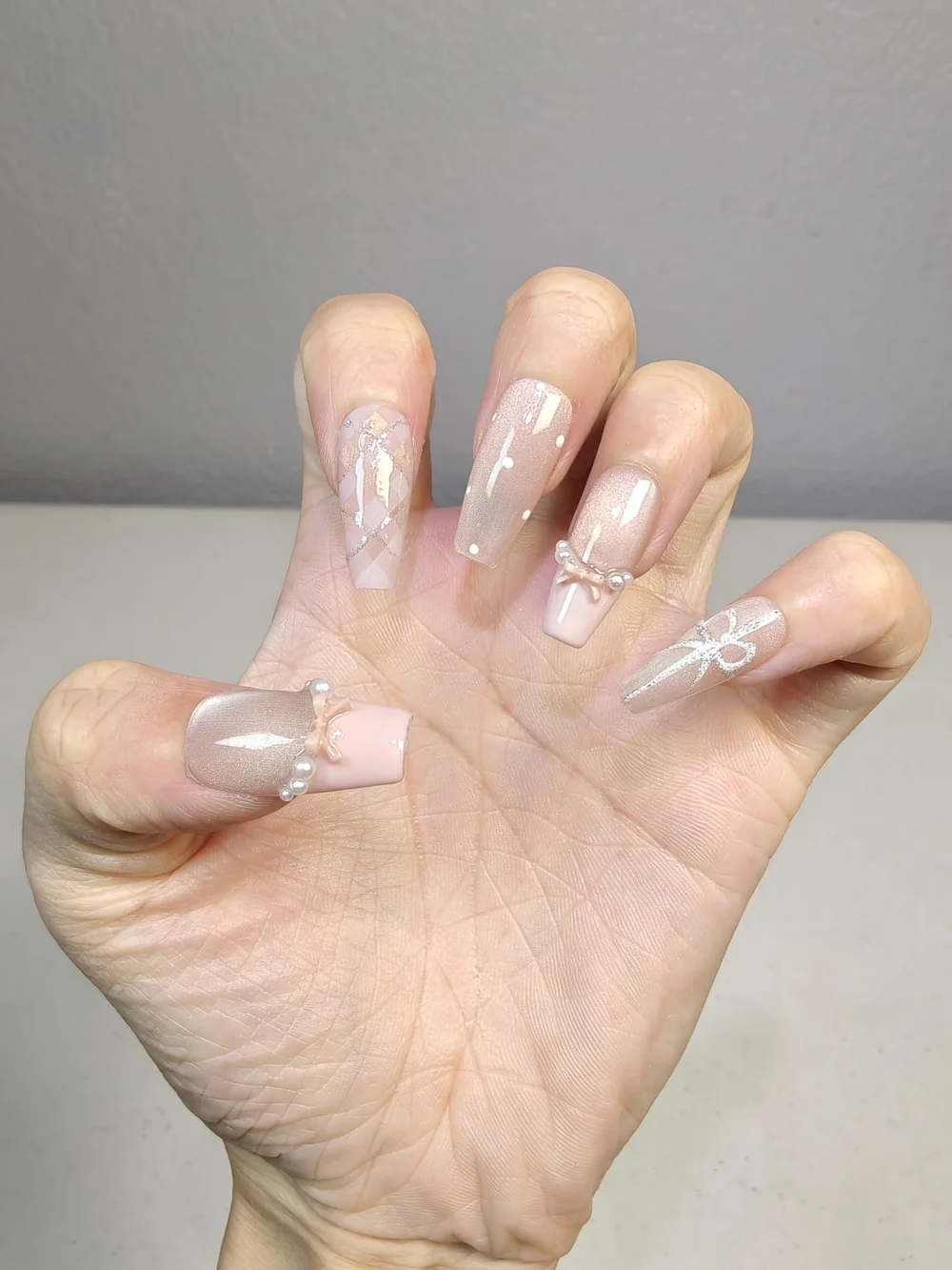 Nude‑Pink Long Coffin Press On Nails With Pink Bows Pearls & Polka Dot